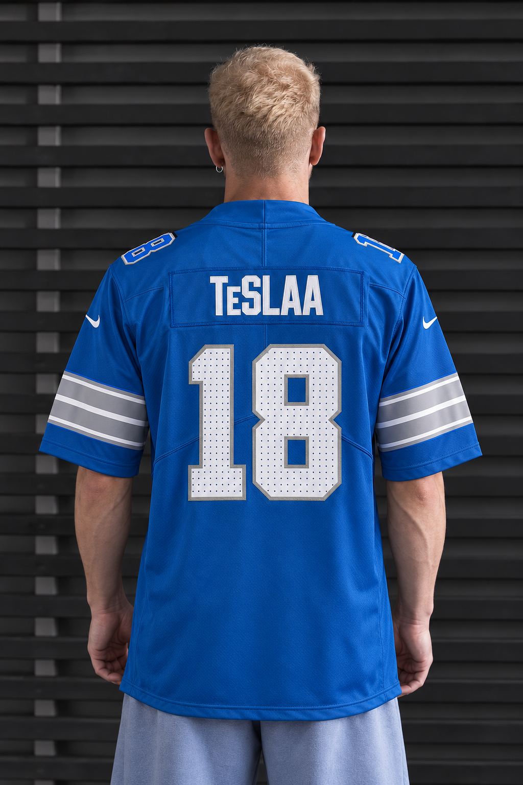 Detroit Lions - Isaac TeSlaa - Vibrant Blue back view